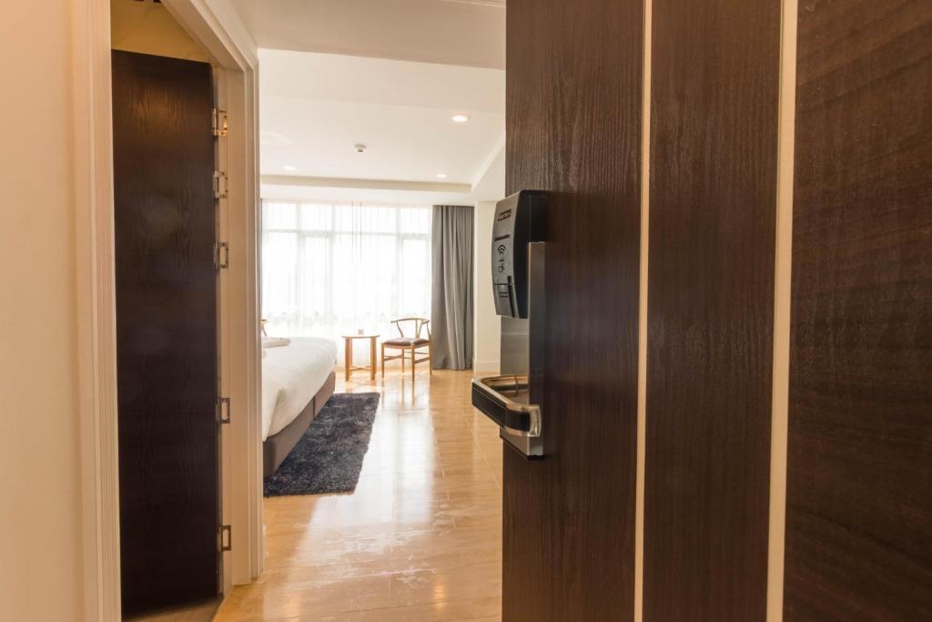 TV a/nebo společenská místnost v ubytování Avada Hotel