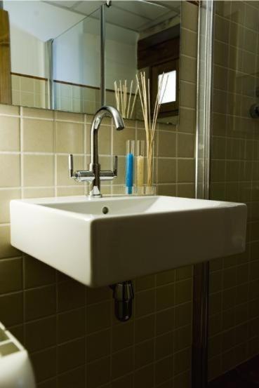 Un baño de Apartamentos Doña Candida