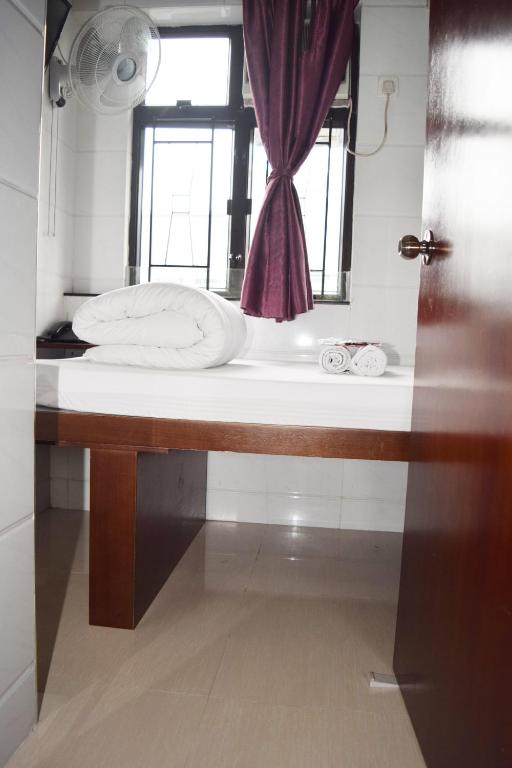 Koupelna v ubytování Pay-Less Guesthouse (7/F A9)