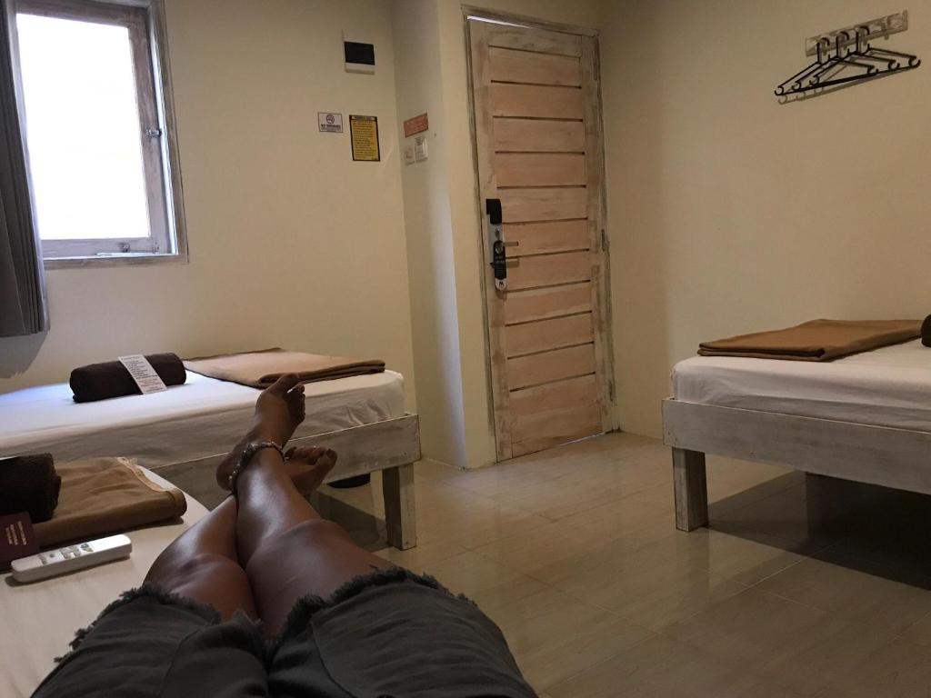 Postel nebo postele na pokoji v ubytování M BOX Gili Trawangan