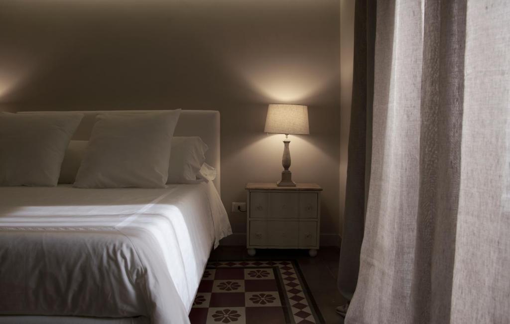 Posteľ alebo postele v izbe v ubytovaní Ferrini Home - Piazza Trento