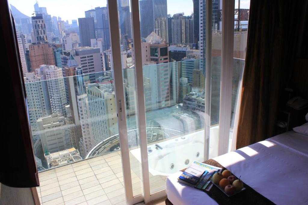 Postel nebo postele na pokoji v ubytování Best Western Hotel Causeway Bay