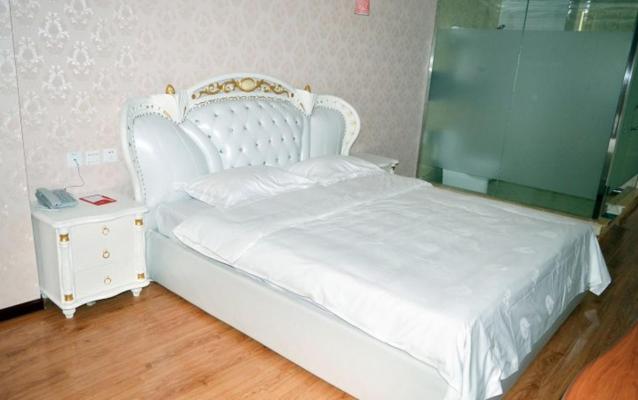 Postelja oz. postelje v sobi nastanitve Thank Inn Chain Hotel Hebei Shijiazhuang Zhao Town Shenghua Street