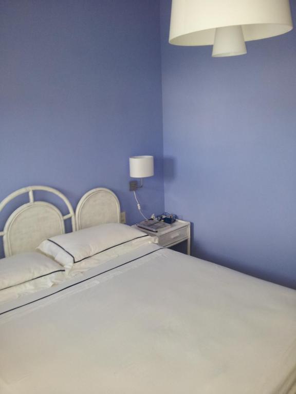 A bed or beds in a room at sole mare versilia