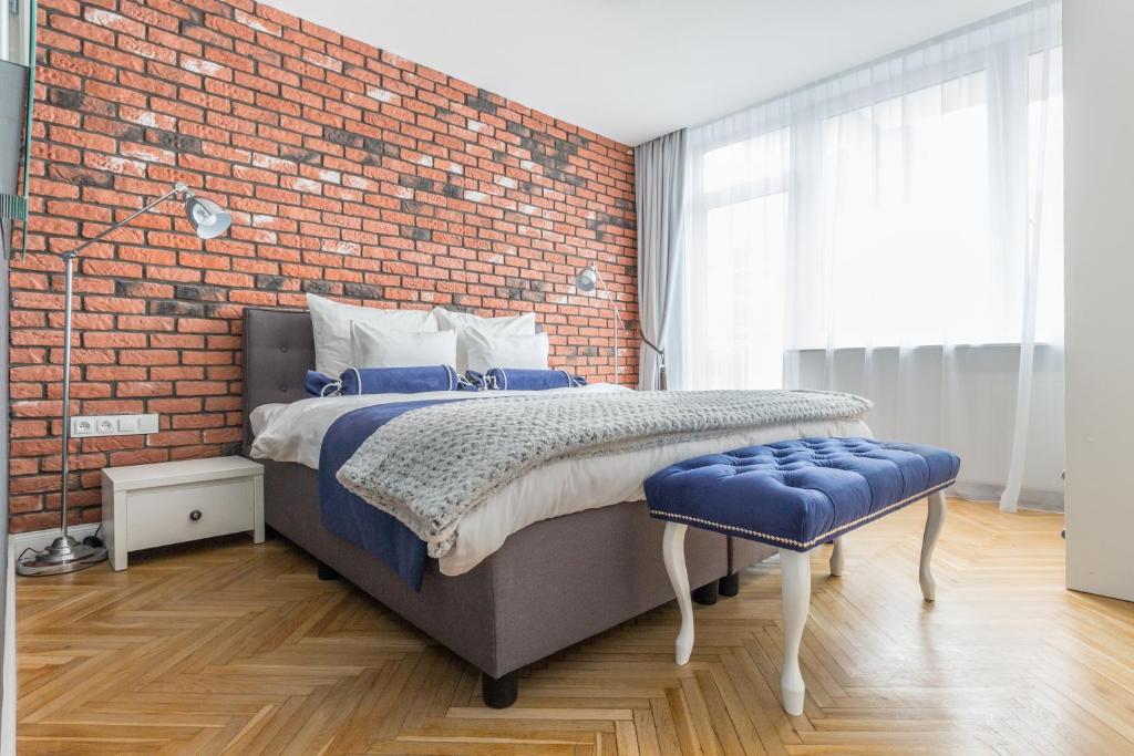 Posteľ alebo postele v izbe v ubytovaní GLAM APARTMENTS city center