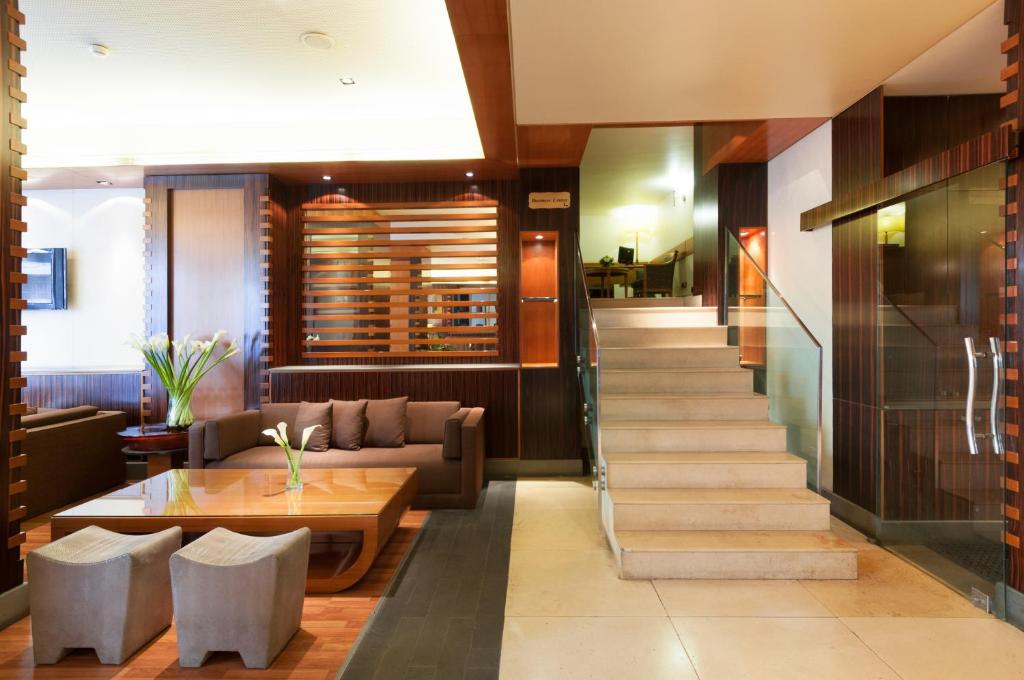 Posezení v ubytování Le Commodore Hotel