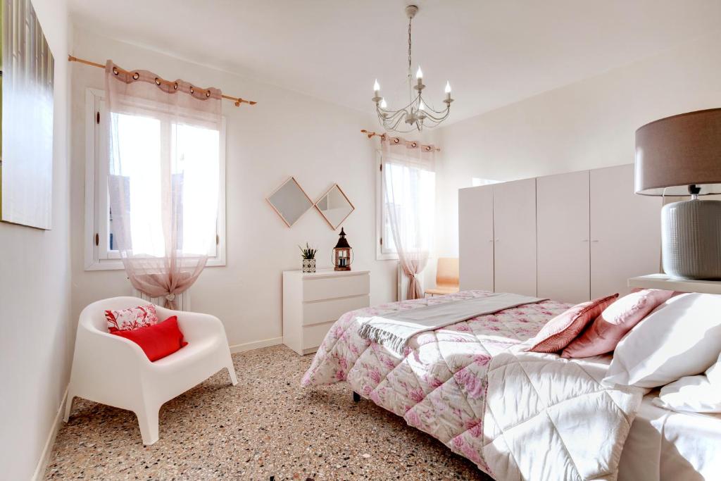 Säng eller sängar i ett rum på Ca' Artisti-S.Margherita