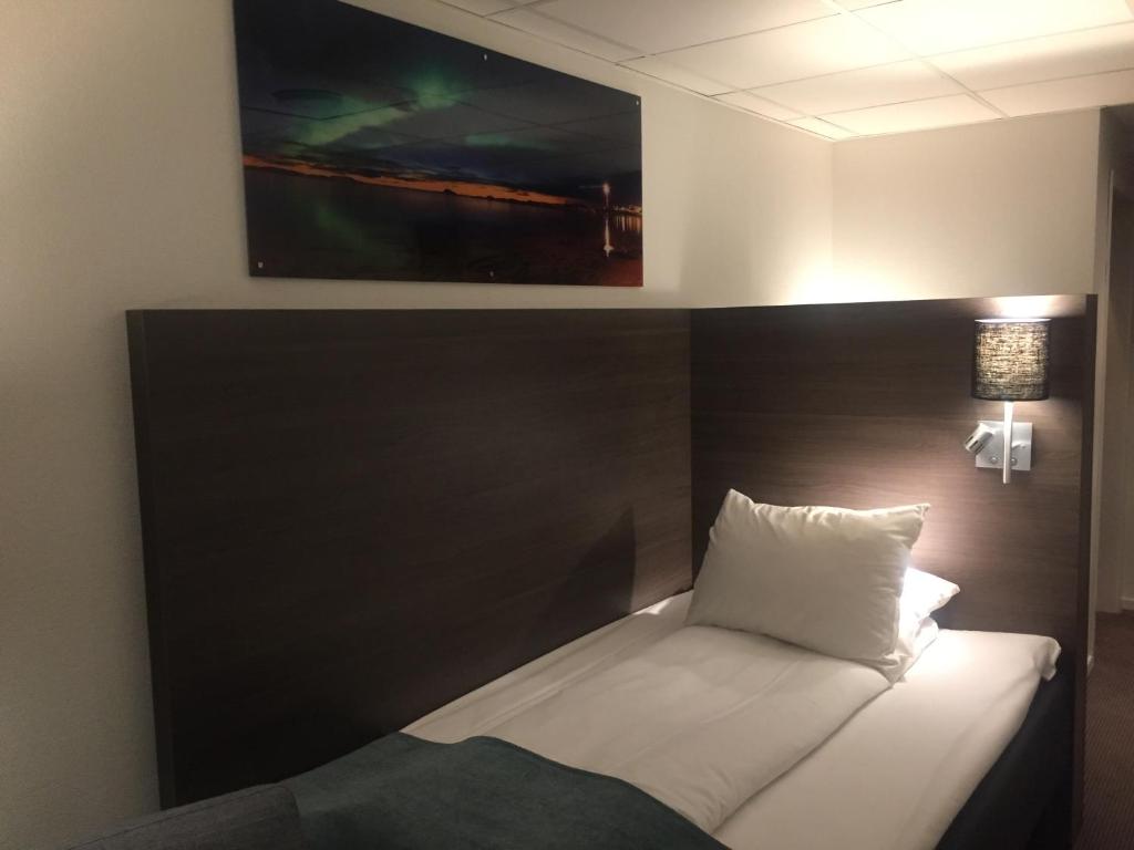 Postel nebo postele na pokoji v ubytování Thon Partner Hotel Andrikken