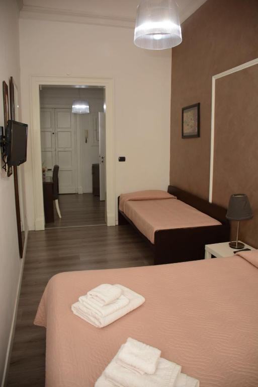 Posteľ alebo postele v izbe v ubytovaní B&B Opera