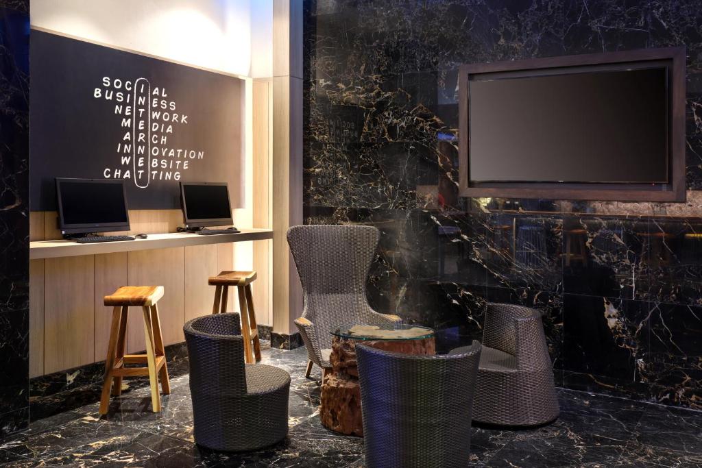 Uma televisão e/ou sistema de entretenimento em Ibis Melaka