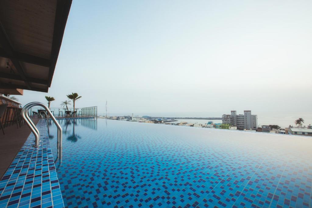 The swimming pool at or close to FangLiao Hotel