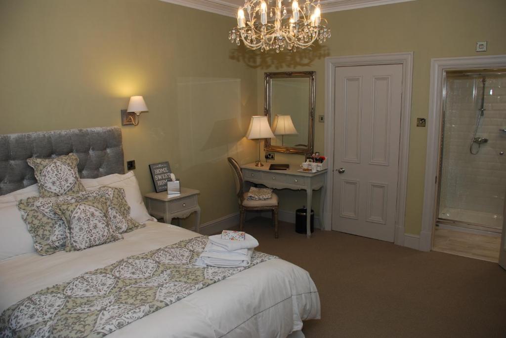 Letto o letti in una camera di Springdale Guest House