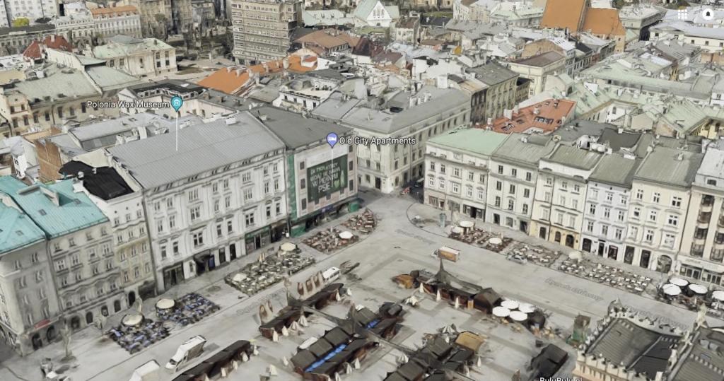 an overhead view of a city with buildings at Main Market Square Apartments in Krakow