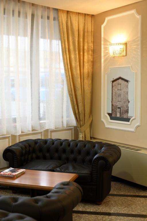 Posezení v ubytování Hotel Alexander