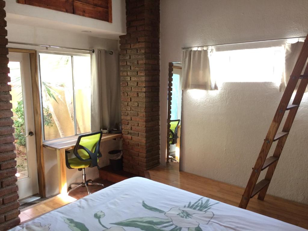 Postel nebo postele na pokoji v ubytování B&B Oui Madame