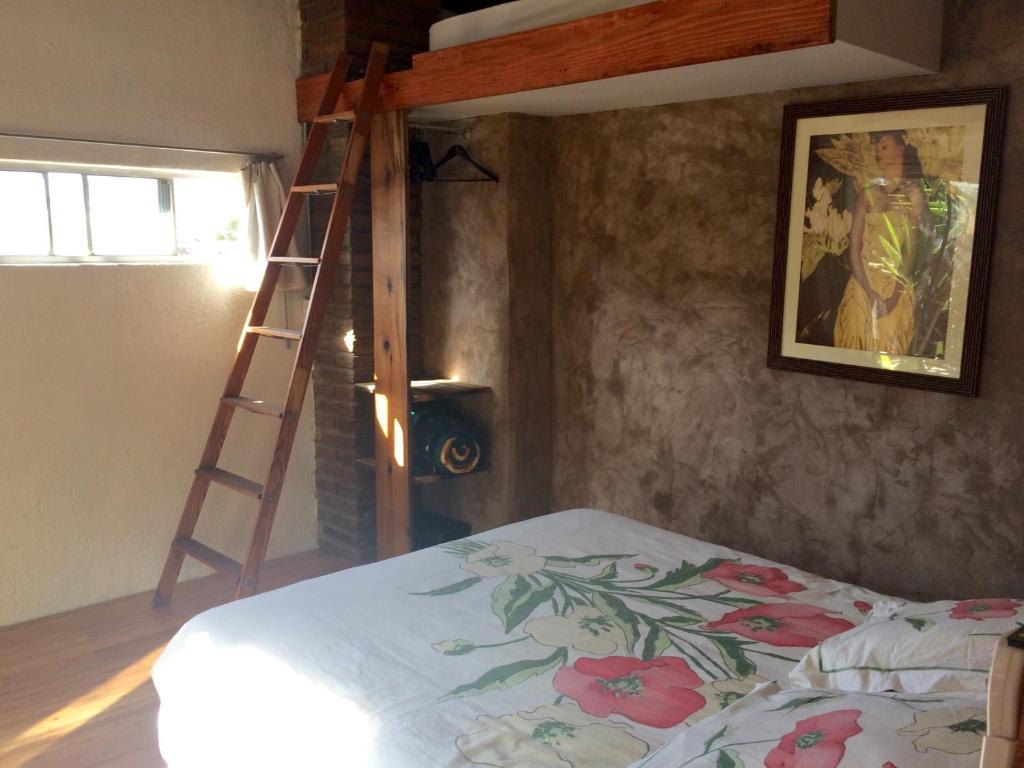 Postel nebo postele na pokoji v ubytování B&B Oui Madame