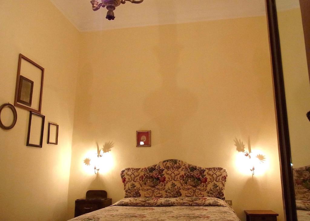 Postel nebo postele na pokoji v ubytování Hotel Cestelli