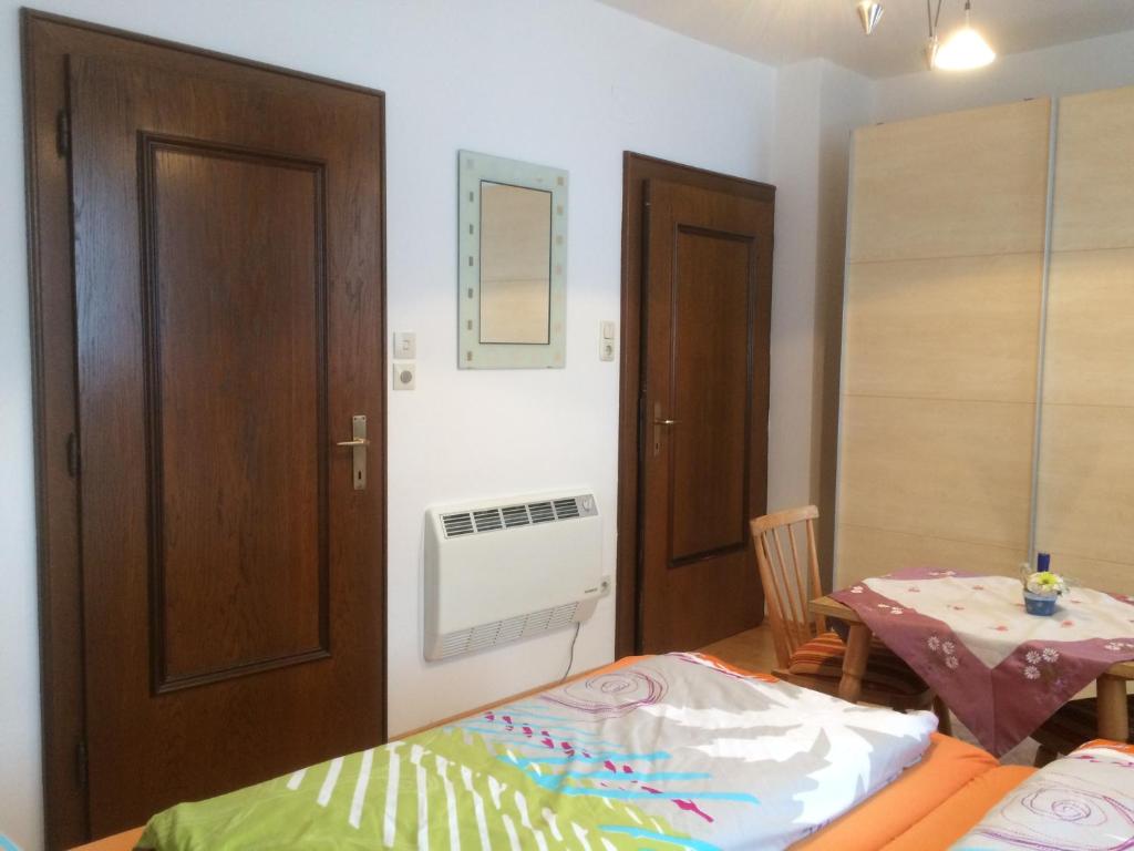 Postel nebo postele na pokoji v ubytování Gästehaus Lackner Zimmer