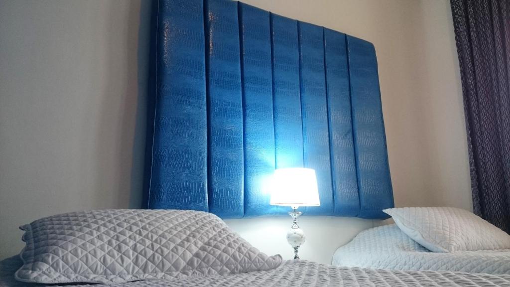 Postel nebo postele na pokoji v ubytování Hotel + Arte