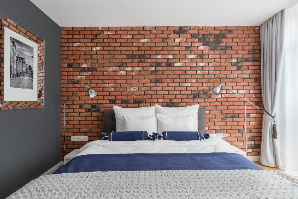 Posteľ alebo postele v izbe v ubytovaní GLAM APARTMENTS city center