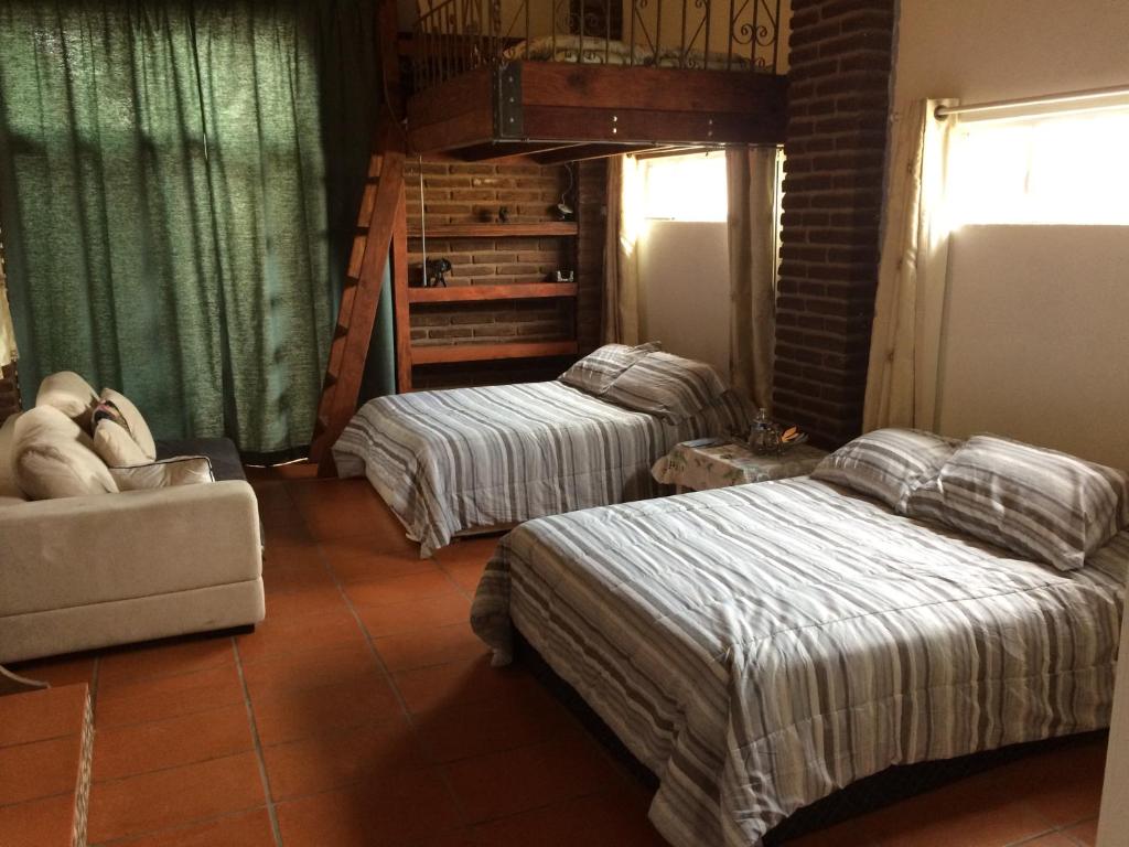 Postel nebo postele na pokoji v ubytování B&B Oui Madame
