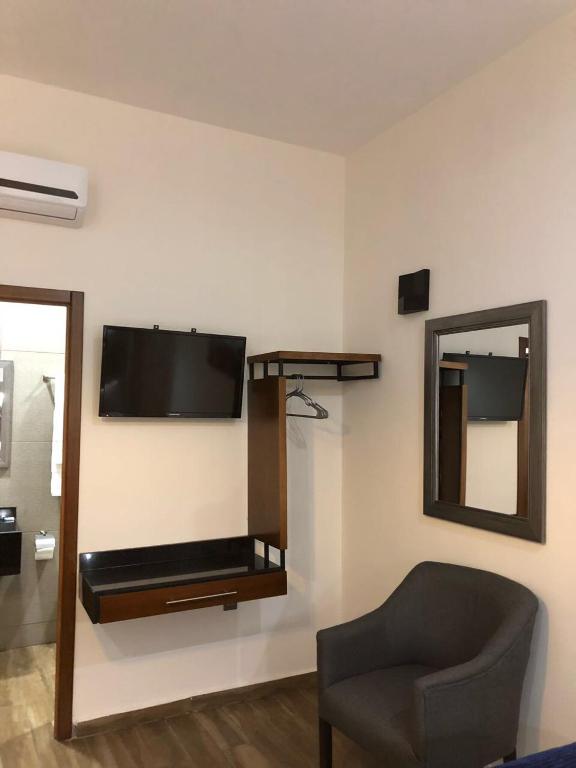 TV a/nebo společenská místnost v ubytování Gold Palace Hotel