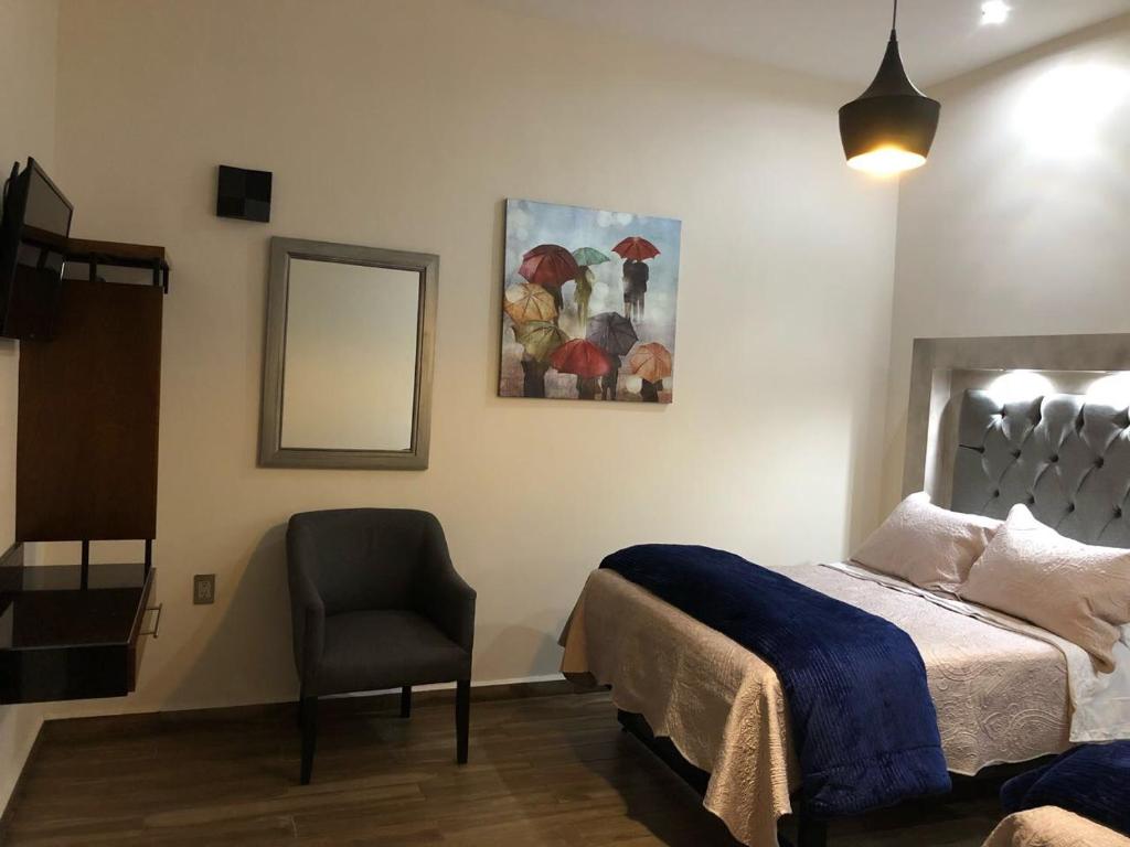 Postel nebo postele na pokoji v ubytování Gold Palace Hotel