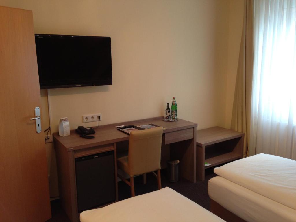 TV a/nebo společenská místnost v ubytování Hotel Destination 21