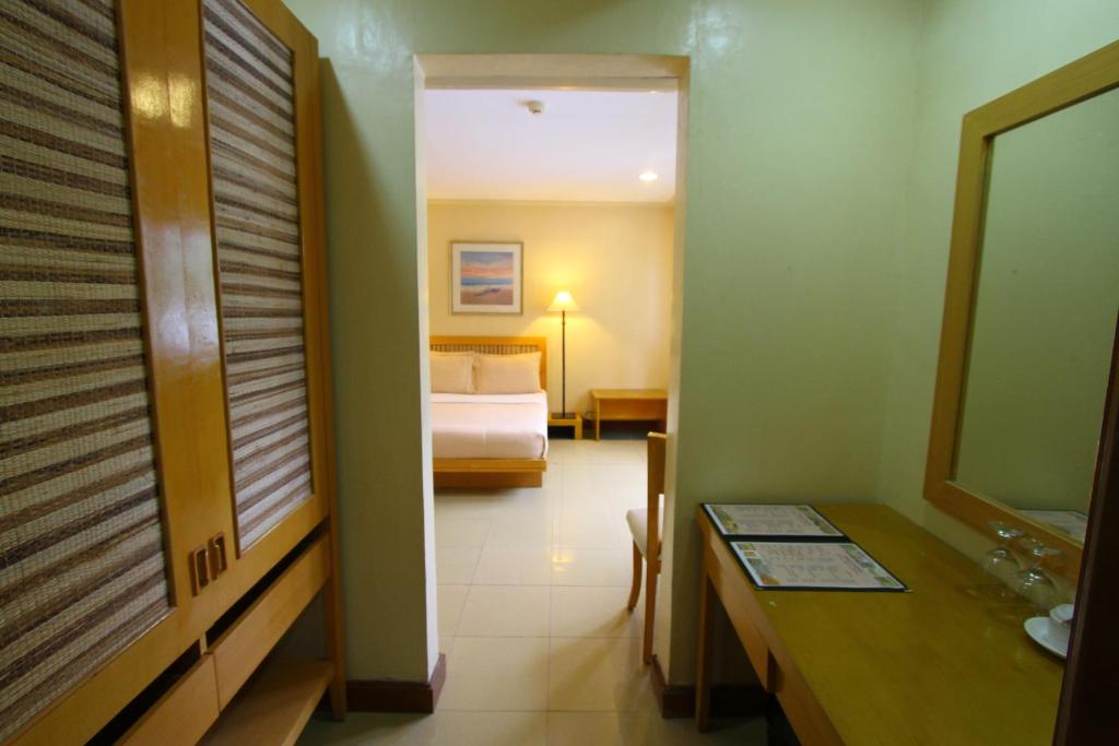 Trace Suites by SMS Hospitalityにあるベッド