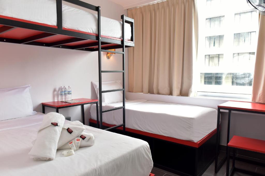 Postel nebo postele na pokoji v ubytování Tune Hotel - Waterfront Kuching