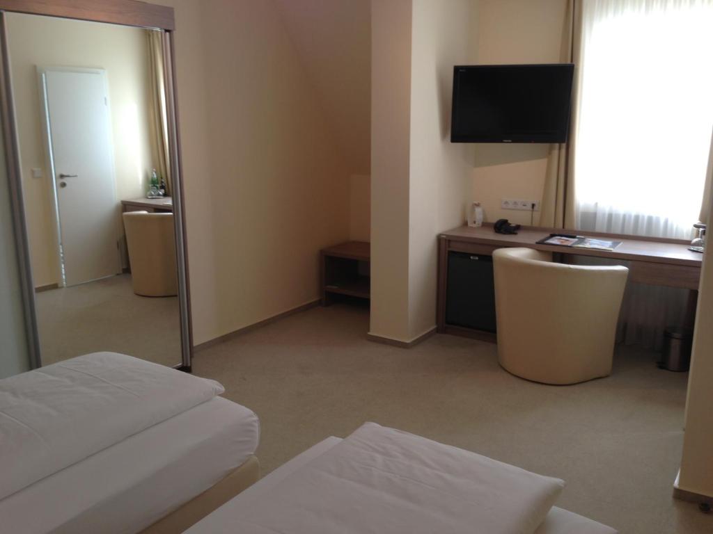 Postel nebo postele na pokoji v ubytování Hotel Destination 21