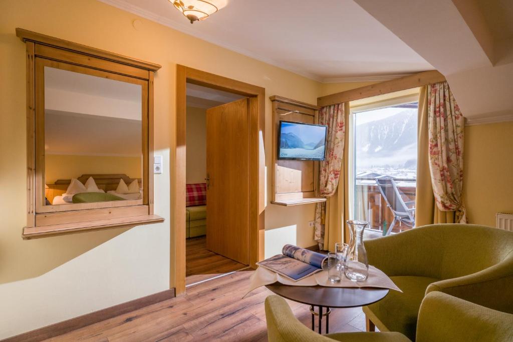 Een TV en/of entertainmentcenter bij Das Rotspitz Adults - only
