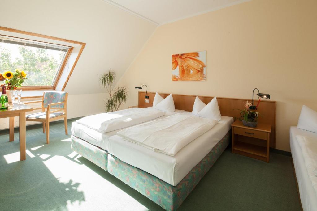 Voodi või voodid majutusasutuse Apart Hotel Gera toas