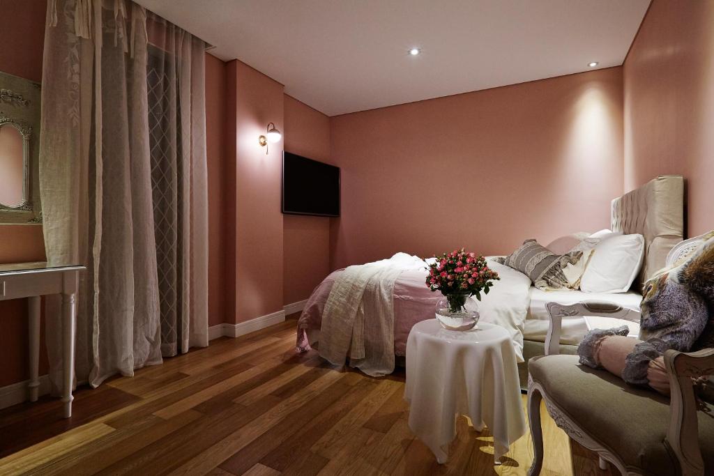 TV a/nebo společenská místnost v ubytování Roseto Hotel