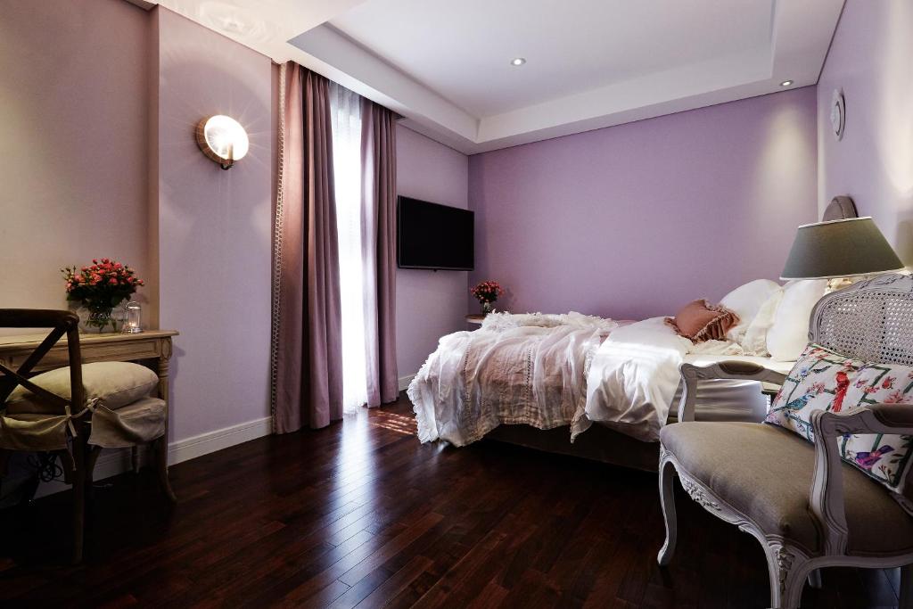 Postel nebo postele na pokoji v ubytování Roseto Hotel