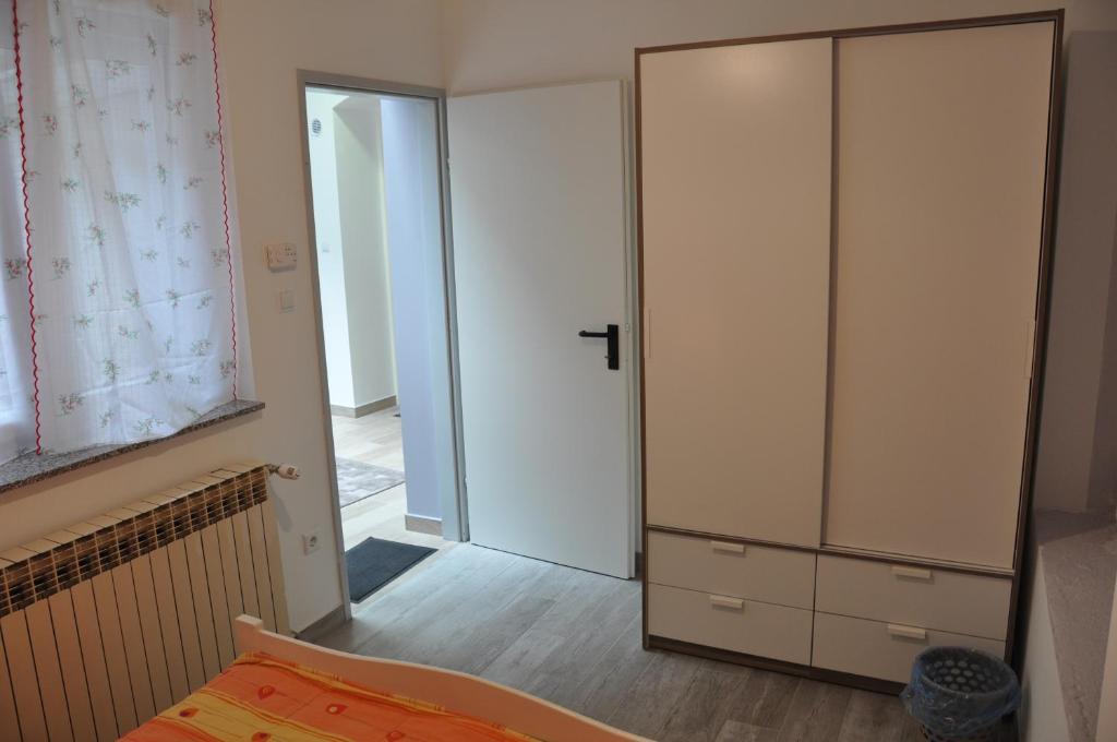 Posteľ alebo postele v izbe v ubytovaní Apartment San Marco