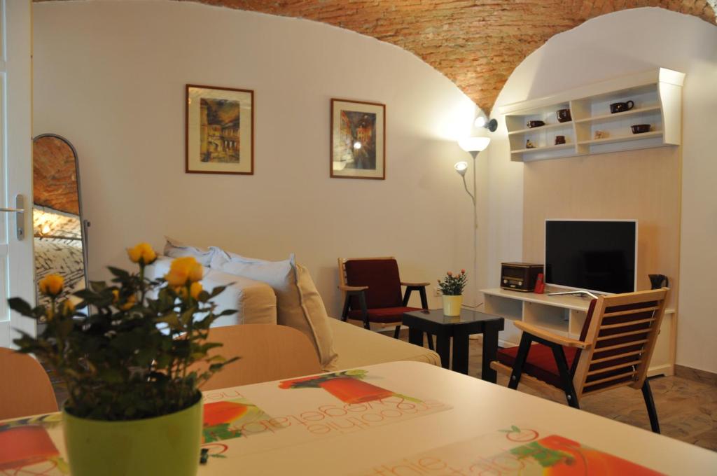 Televízia a/alebo spoločenská miestnosť v ubytovaní Apartment San Marco