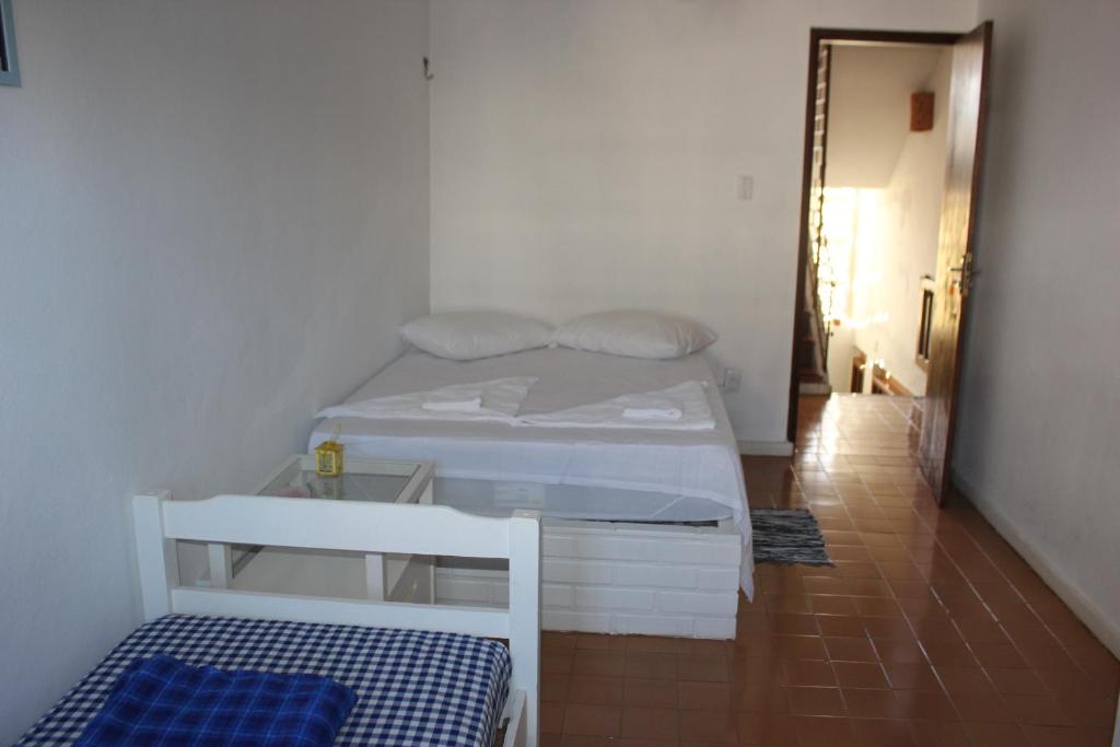 Voodi või voodid majutusasutuse Hostel Luz toas