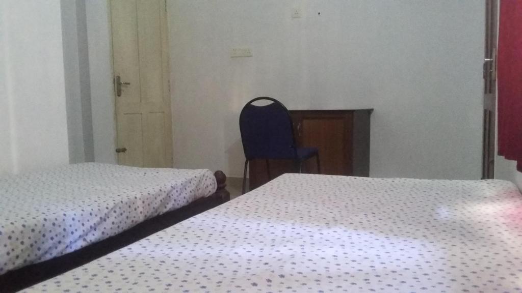 Postel nebo postele na pokoji v ubytování Juliet's Homestay