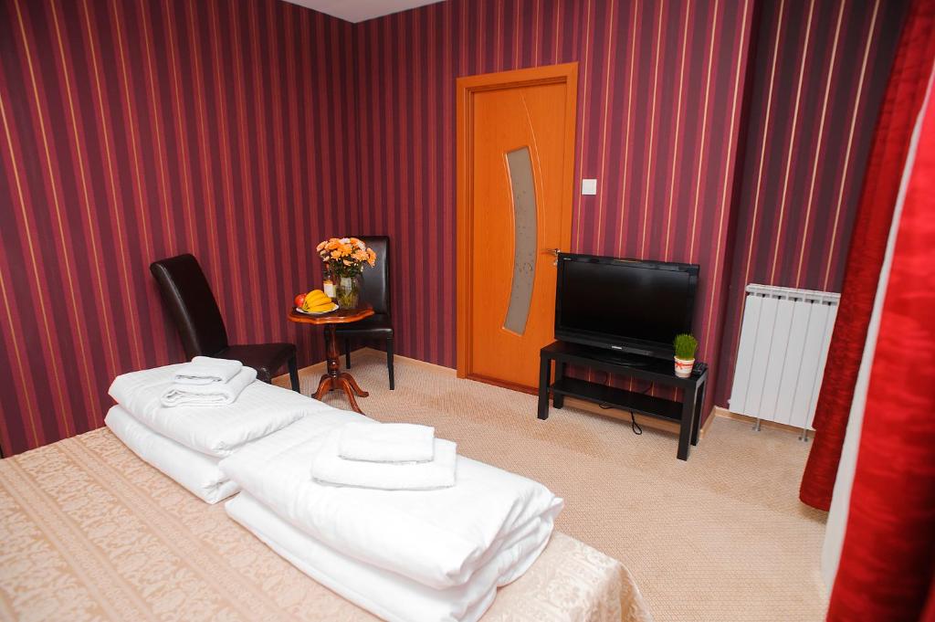 Postel nebo postele na pokoji v ubytování Villa Bulevar