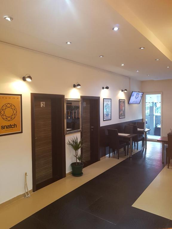 TV a/nebo společenská místnost v ubytování Apartments Agape