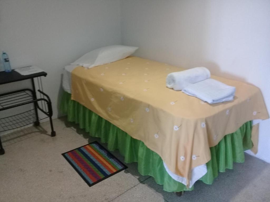 Postel nebo postele na pokoji v ubytování Hostel Quintonido