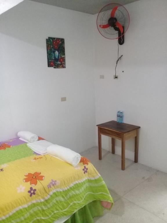 Postel nebo postele na pokoji v ubytování Hostel Quintonido