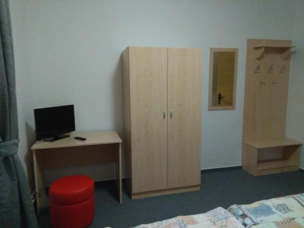 TV a/nebo společenská místnost v ubytování Hotel Lidový dům