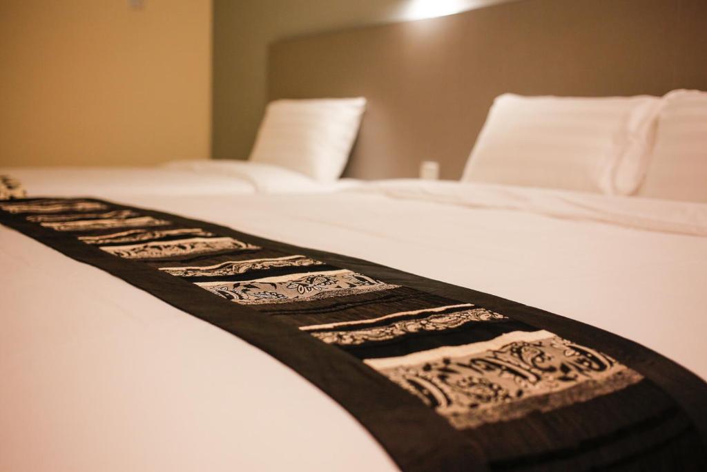 Postel nebo postele na pokoji v ubytování Art Cottage Hotel