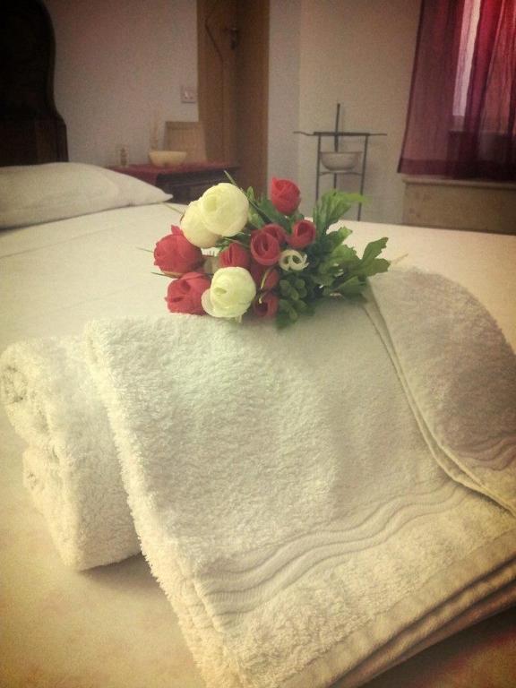 Postel nebo postele na pokoji v ubytování B&B Il Tulipano
