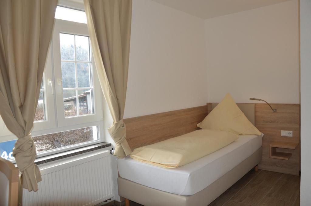 Postel nebo postele na pokoji v ubytování Hotel Mezzero