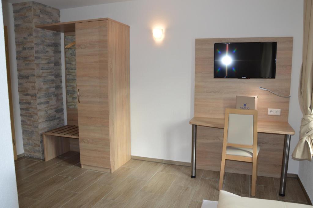 TV a/nebo společenská místnost v ubytování Hotel Mezzero