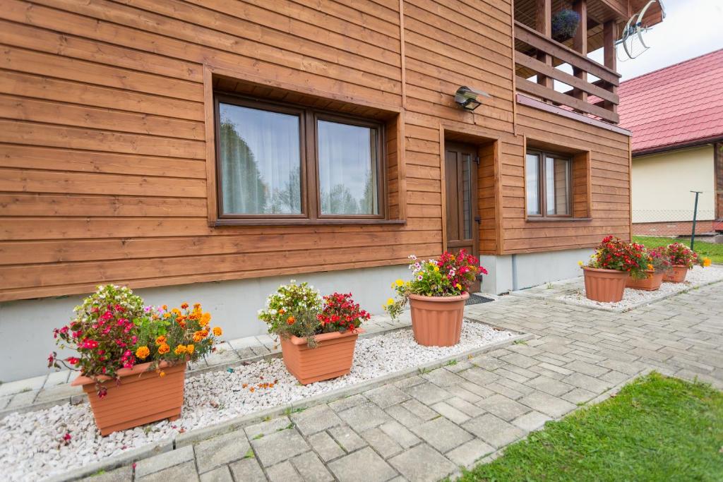 Vonkajšia záhrada v ubytovaní Pokoje Gościnne "Spokojna 10" 600-065-145