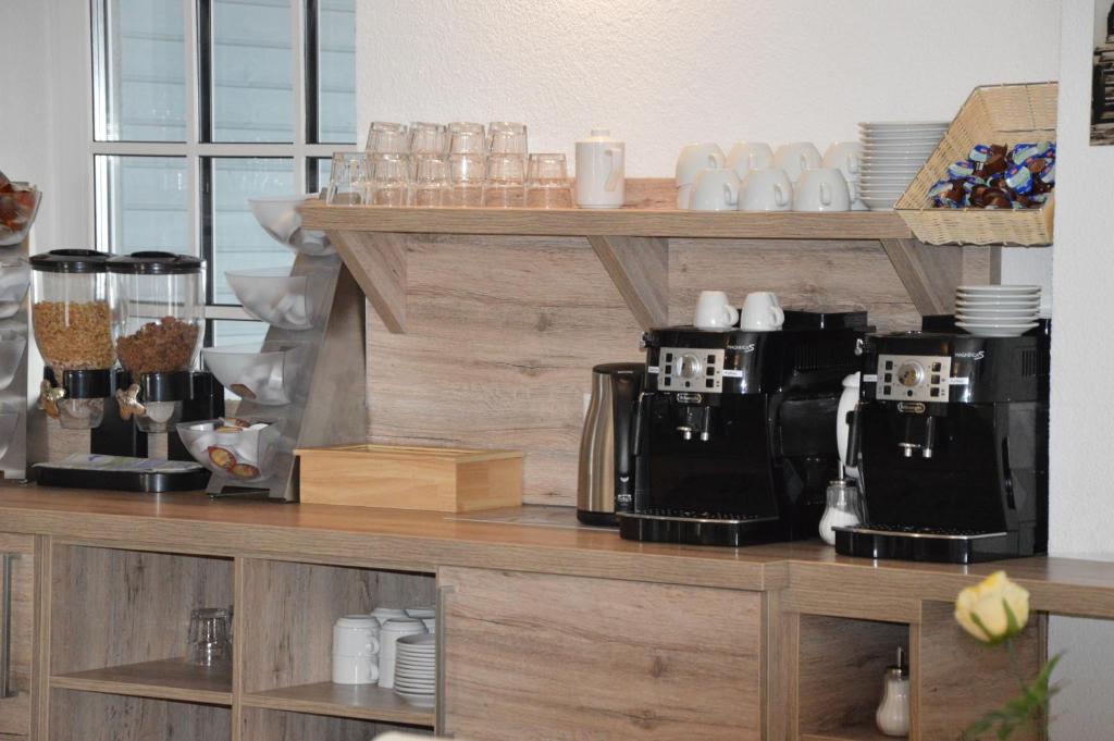 Příslušenství pro přípravu čaje a kávy v ubytování Hotel Mezzero